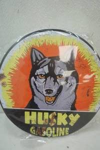 lot 145 image: 12 Tin HUsky Gasoline