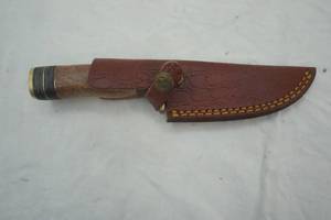 lot 157 image: 4.5 knife with leather sheath