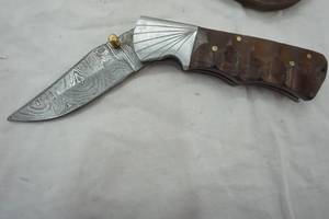 lot 160 image: Pocket Knife with a leather pouch