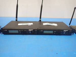 lot 19 image: SHURE ULXS4 Receiver x2 Units  Includes Audio Technicia Pro 88 WR Wireless Microphone Receiver with AUX Microphone x2 units  Includes 2 Generic AUX Microphones 