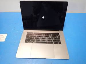 lot 48 image: Apple&nbspA1990 MacBook Pro 15,1 &nbspINTEL CORE I7-9750H 2.6 Ghz  32GB DDR4 SDRAM  500GB SSD  15.4 screen with 2880 x 1800 HD Resolution  Includes IOS and Charger &nbspcommand key white 
