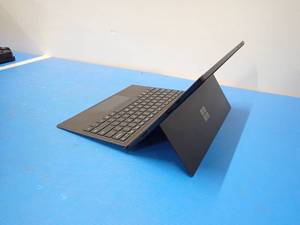 lot 69 image: Microsoft&nbspSurface Pro 7 1866 &nbspINTEL CORE I5-1035G4 1.1 Ghz  8GB LPDDR4 RAM  256GB SSD  Includes Keyboard Case  No Cables  slight&nbspWhite spots on screen 