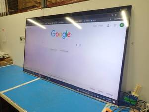 lot 74 image: Samsung UN82NU8000FX2A Flat 82 UHD Series Smart LED TV  Includes power cable and remote  TV has small bright spot in center of the screen  ($3500 new on amazon)
