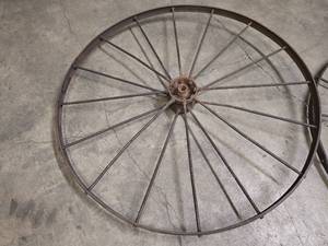 lot 4 image: Pair of large vintage 55 metal wagon wheels