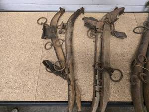 lot 11 image: 3 vintage wooden sets of horse hames and 1 vintage set of metal horse hames