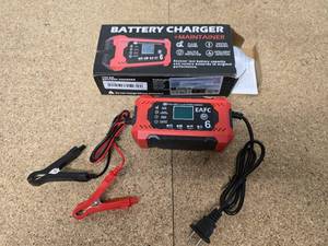 lot 22 image: 12V 6A Battery Charger and 1776 We the People Flag
