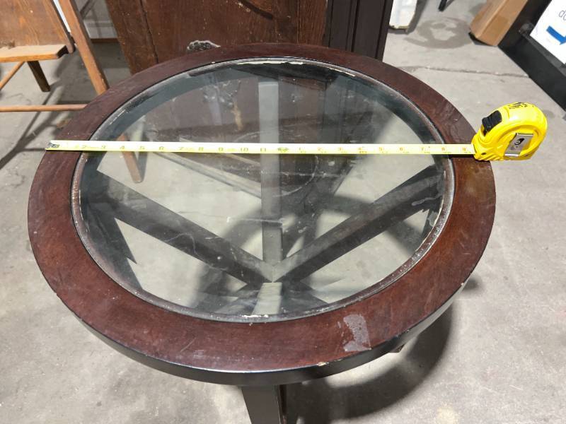 lot 1381 image: ANTIQUE WOOD ROUND TABLE WITH GLASS TOP, JELLY CUPBOARD, HIGH CHAIR, ROCKING CHAIR, MAGAZINE RACK LOT