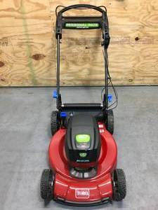 lot 1 image: Toro 60V Max 22 in. Recycler wPersonal Pace & SmartStow Lawn Mower With 5.0Ah Battery And Charger Model #21466