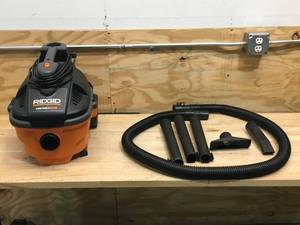 lot 83 image: Ridgid 4 Gallon Portable WetDry Vac Model # WD4070