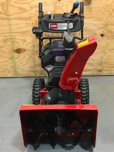lot 10A image: New Toro 24 in. (61 cm) Power Max e24 60V Two-Stage Snow Blower Model # 39925 (Includes 1 - 6Ah Battery And Charger)