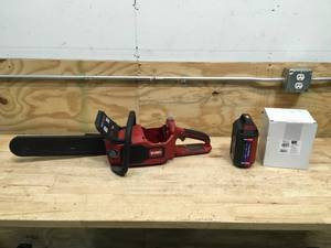 lot 143 image: Toro 60V MAX 16 in. Brushless Chainsaw with 2.0Ah battery and charger Model # 51850