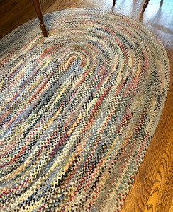 lot 82 image: Multi-Colored Oval Braided Rug