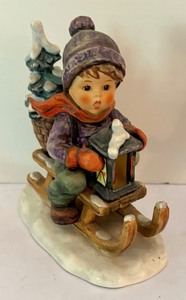 lot 186 image: Four Adorable Hummel Figurines including Hummel Figurine Ride Into Christmas, Hummel Figurine Little Fiddler & More