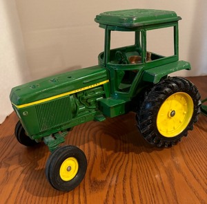 lot 211 image: Vintage Die Cast John Deere Tractor and Implement by Ertl