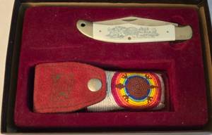 lot 286 image: Limited Series Scrimshaw Lockblade with beaded Native American Case
