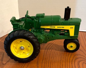 lot 146A image: Two Die Cast John Deere Tractors and Implements