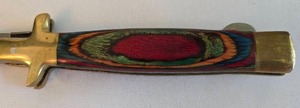 lot 332 image: Folding Knife with Unique Multi-Colored Wooden Hilt.