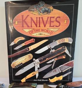 lot 335 image: Large Lot of Folding Knives Plus Knives of the World Manual