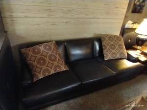 lot 1 image: Black Couch