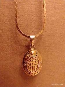 lot 249 image: Long Necklace w Pendant Marked 14K
