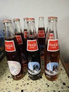 lot 380 image: Eight ND Centennial Coke Bottles