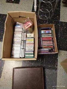lot 410 image: Cassettes, Christmas CDs & CD Stand