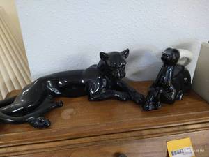 lot 442 image: Two Black Porcelain Animal Figurines