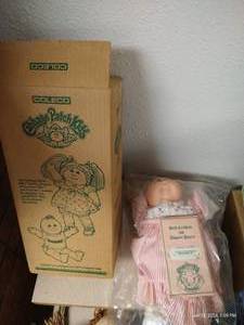 lot 443 image: The Original Cabbage Patch Doll w Box & Unopened Papers Mabel Elora