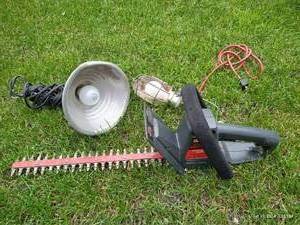 lot 632 image: Craftsman Hedgetrimmer  (2) Portable Hanging Lights
