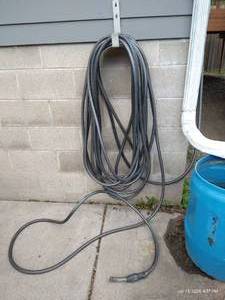 lot 677 image: Long Garden Hose