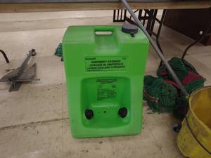 lot 17 image: Honeywell Emergency Eyewash Fendall Porta Stream II with Mop Bucket and Mops