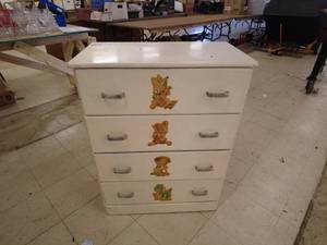lot 69 image: Vintage Wooden 4-Drawer Dresser with Decal Decorations