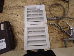 lot 76 image: Lot of HVAC Vent Covers and Kitchen Faucet