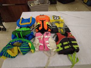 lot 145 image: Lot of 7 Assorted Life Jackets and Vests