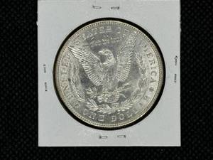 1886 Morgan Silver Dollar Marked BU63 When Purchased