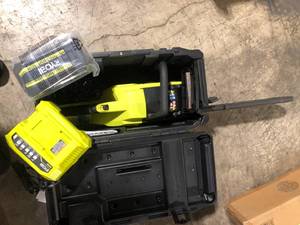 Ryobi 18 in. HP 40V Brushless Lithium-Ion Electric Cordless Battery Chainsaw  CASE  BATTERY AND CHARGER INCLUDED  Customer Returns See Pictures