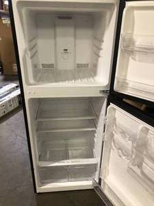 Danby 10.1 cu. ft. Top Freezer Refrigerator in Black, Counter Depth scratch and dent See pics