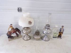 lot 72 image: 3 Kerosene Lamps with Cowboy Dcor