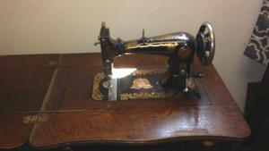 lot 806 image: Sewing Machine and Great Cabinet.