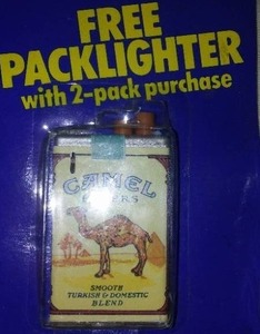 lot 636 image: Camel lighter new in package