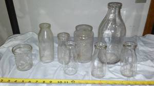 lot 665 image: Vintage Glass Milk Bottles And More.