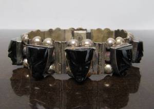 lot 35 image: Old Vintage 1950s era Southwestern Sterling Silver Bracelet wCarved Onyx Faces