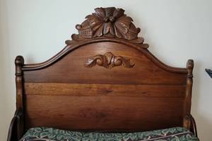 lot 15 image: Ornately Carved Antique  Walnut 34 Bed Frame
