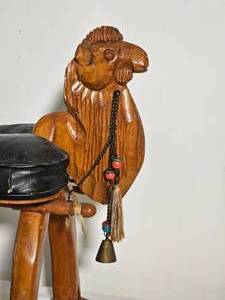 lot 28 image: Vintage Camel Saddle Footstool