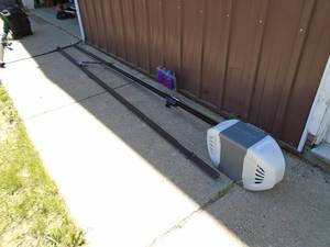 Chamberlain Wi Fi 8 garage door opener from 2021. Looks unused. No remote, eyes or mounting hardware. As shown.