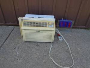 Heier 5000 btu air conditioner. Well used but still works. No remote. As shown.