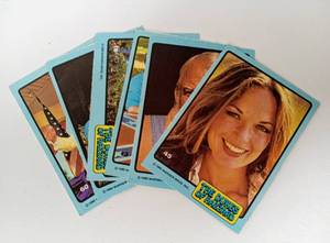 lot 74 image: Vintage 80s Collectibles Including CALIFORNIA RAISINS and DOMINOS Noid Figurines with MORK & MINDY and DUKES OF HAZARD Cards