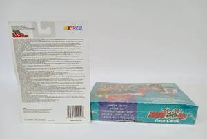 lot 64 image: Vintage Unopened Box of WHEELS NASCAR Racing Trading Cards with New in Box 1996 Jeff Gordon Die-Cast Car by RACING CHAMPIONS
