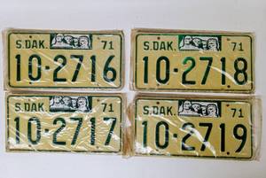 lot 49 image: Lot of Four Sequential Pairs of Unused 1971 South Dakota License Plates (2716 - 2719)