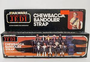 lot 9 image: Vintage KENNER Chewbacca Bandolier with Box, Unopened Chewbacca Miniature and Return of the Jedi PRESTO MAGIX Set